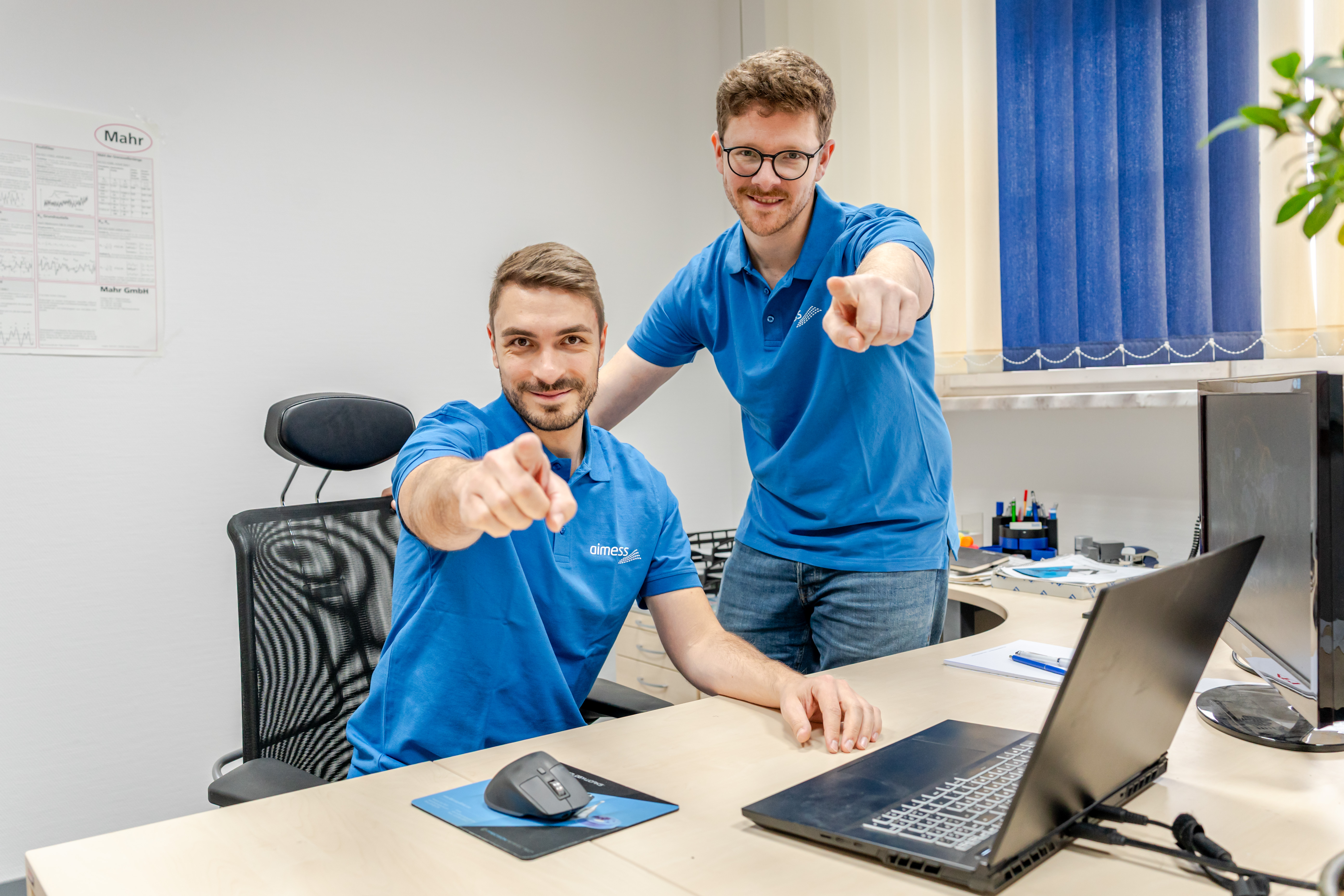 Two Aimess technicians
